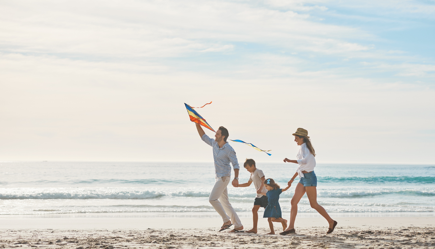 family on the beach in northwest florida