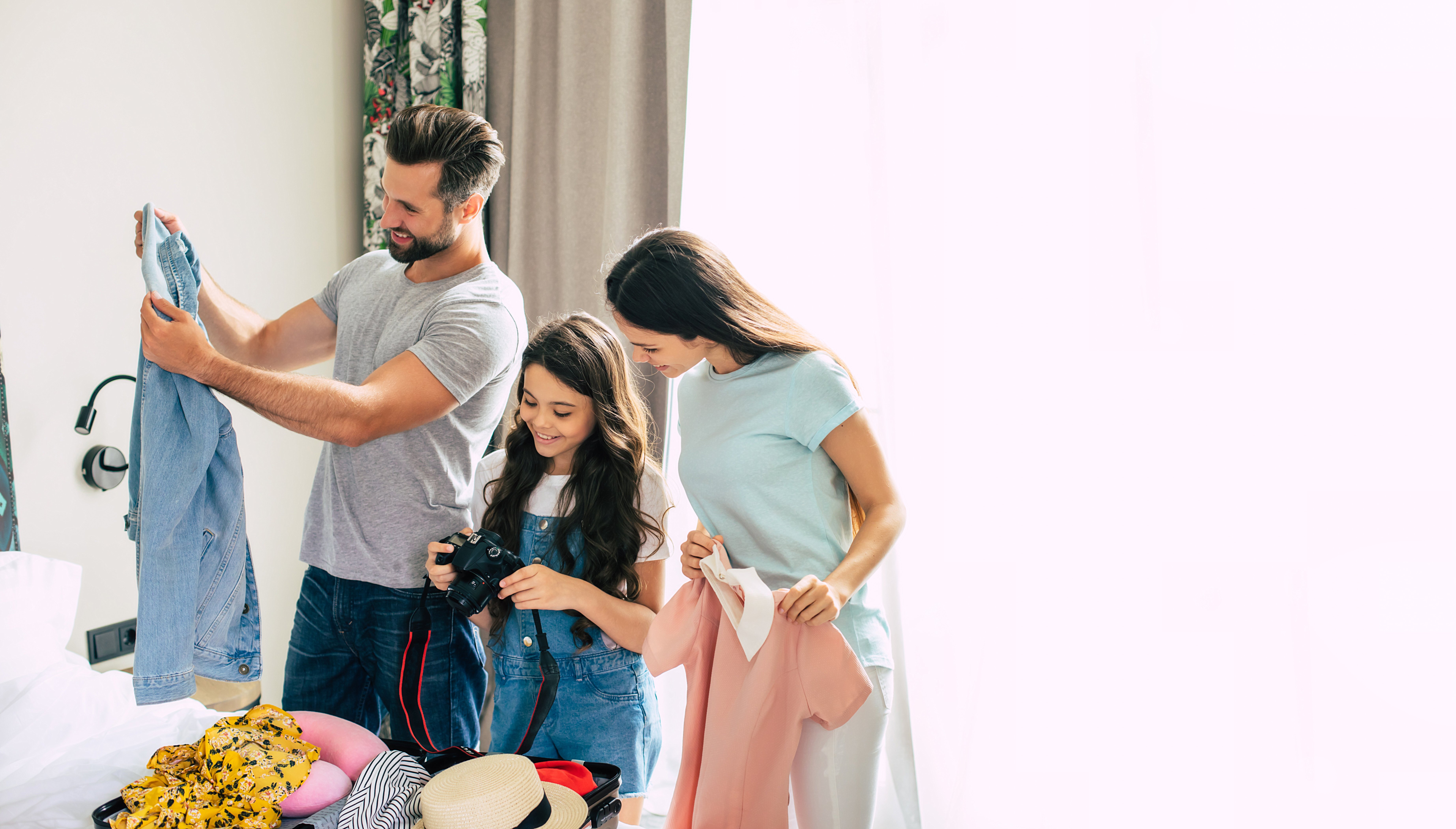 family unpacking at vacation rental