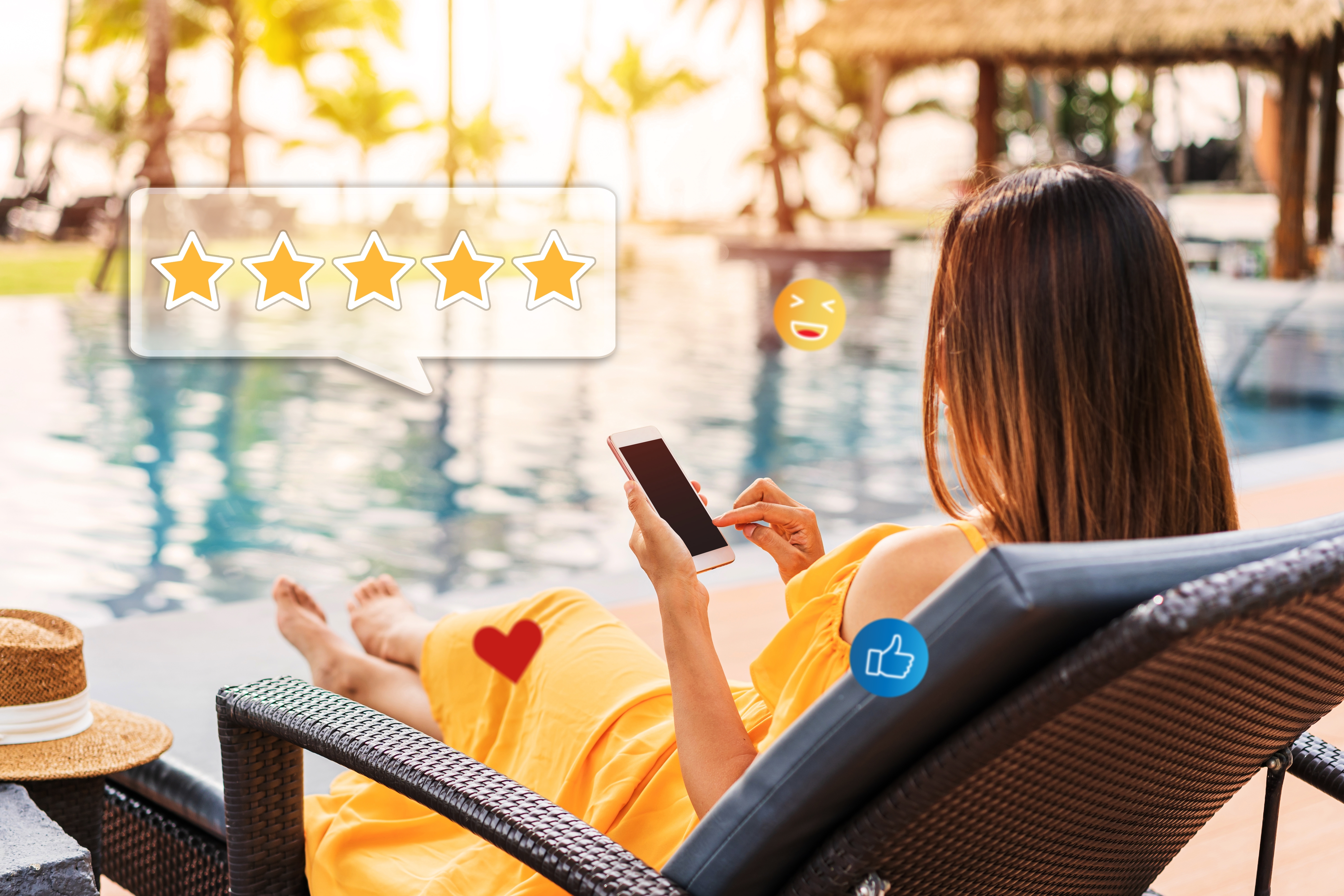 vacation rental guest using her smartphone to give a five star review